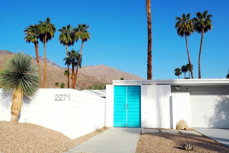 Headed to the desert? You need to add a Palm Springs door tour to your itinerary! I’ve included all my favorites here -- including the famous Palm Springs pink door!